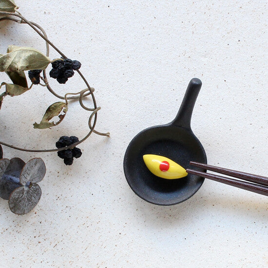 Spisepindeholder Stegepande med omelet